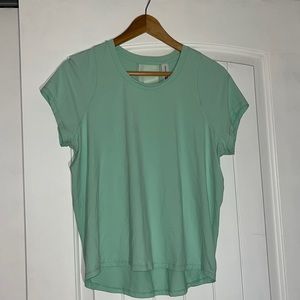 Size S could fit M as well, turquoise athletic shirt, ALL IN MOTION brand.